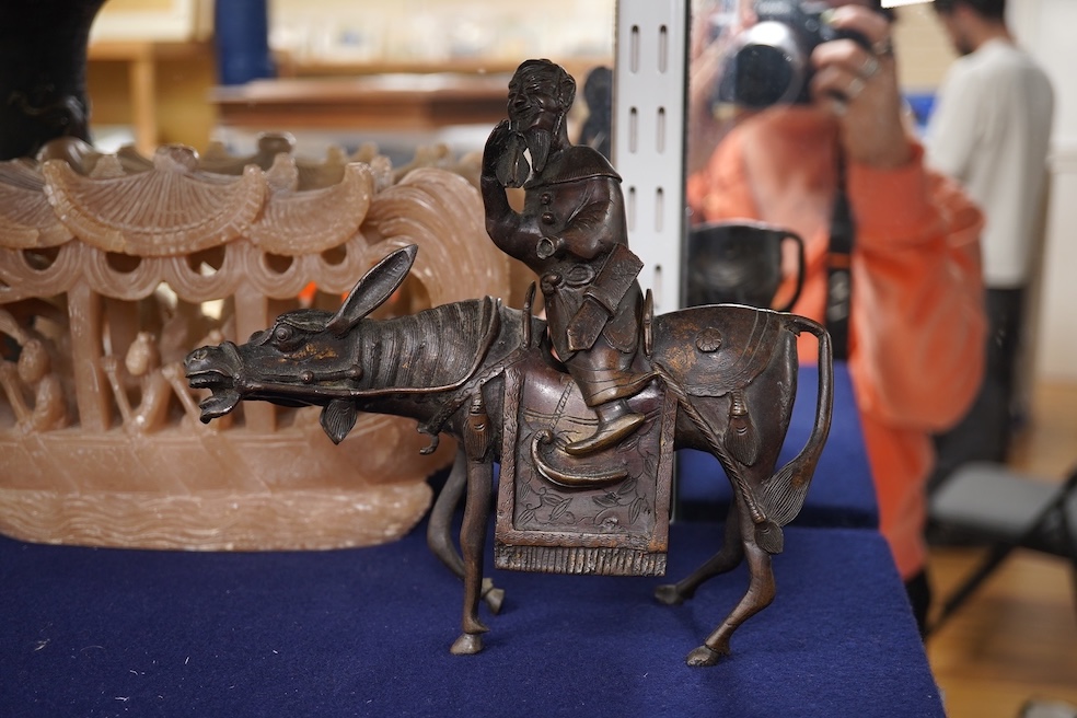 A Japanese bronze dragon vase, Chinese bronze immortal on donkey, and soapstone dragon boat carving, bronze vase 24cm high. Condition - good
